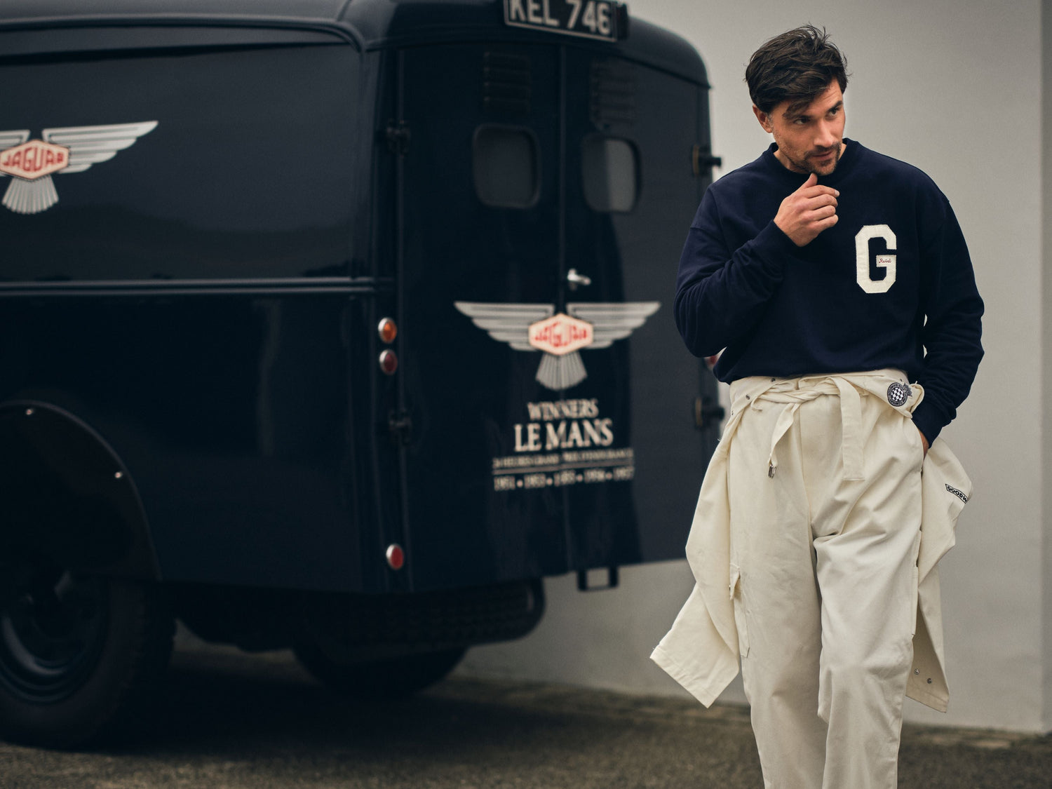 Model wearing Goodwood Revival G Sweatshirt and Overalls by Le Mans Van