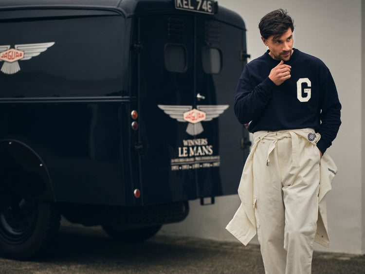 Model wearing Goodwood Revival G Sweatshirt and Overalls by Le Mans Van