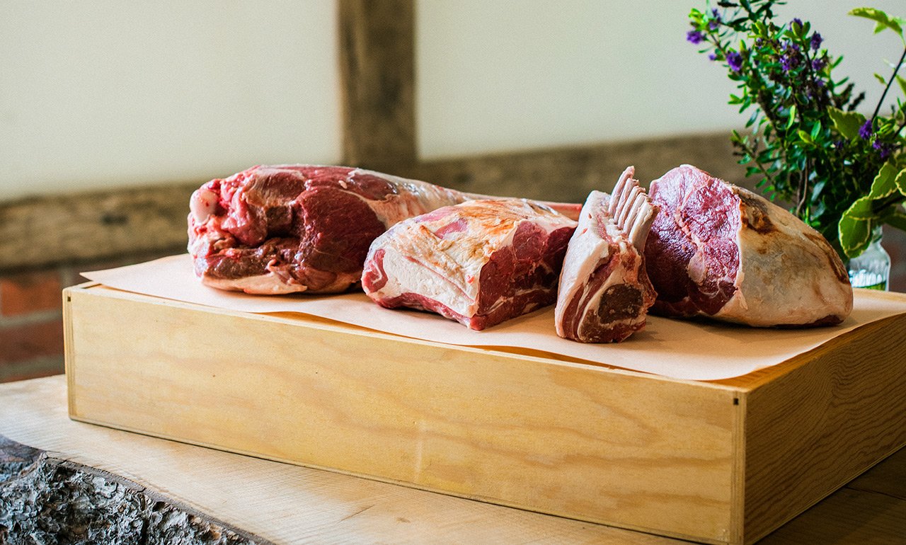 A selection of organic grass-fed West Sussex meat joints, including organic lamb, beef and pork, from the Goodwood Farm Shop.