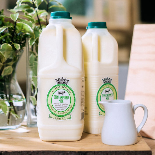 Close up of Goodwood Organic Semi-Skimmed Milk, available in 1 and 2 litre sizes, from Goodwood Farm Shop.